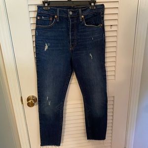 Levi’s 501 Skinny in dark distressed wash